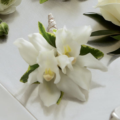 White Mini Cymbidium Boutonniere – FONSECA'S FLOWERS, San Bernardino CA